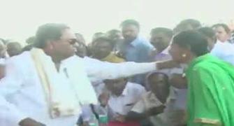 Siddaramaiah snatches mike during wordy duel with woman party worker