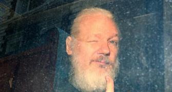 Assange jailed for 50 weeks for jumping bail in UK