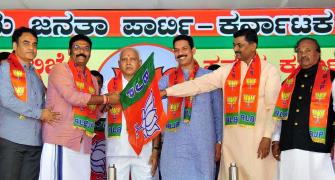 16 disqualified K'taka MLAs join BJP; 13 get tickets