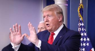 US COVID-19 toll soars; Trump asks all to wear masks