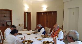 PHOTOS: Shah, Mamata share lunch at Patnaik's home