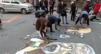 PIX: Jamia students paint road with anti-CAA graffiti