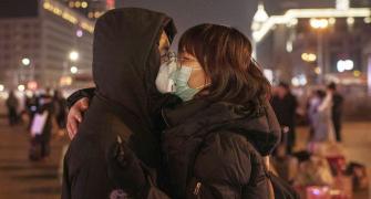 Coronavirus-hit Chinese city suspends public transport
