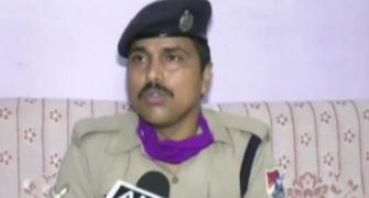 RPF cop runs behind moving train to give milk to baby
