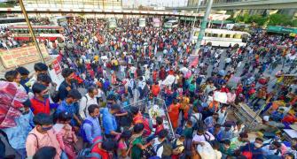 Migrants head home despite Kejriwal's assurance