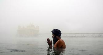 Golden Temple Wrapped In Fog