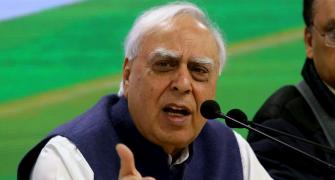 Gandhis should step aside, says Sibal; Cong hits back