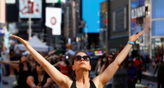 Over 3,000 people perform Yoga at iconic Times Square