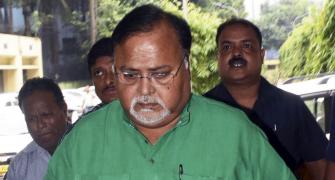 Bengal minister arrested after Rs 21cr found with aide