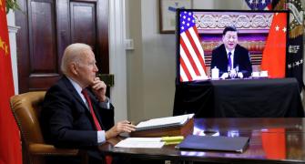 Xi talks tough with Biden, says China can't be stopped