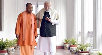 Yogi posts pic of walking with Modi, Twitter goes nuts