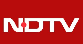 Adanis acquire promoter co, offer to buy 26% in NDTV
