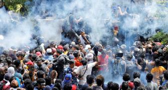 Rajapaksa Flees, But Protests Continue