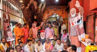 Prayers at temples, bulldozers' 'aarti' for Yogi oath