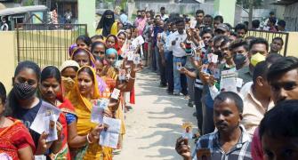 Govt considering to link Aadhaar with electoral rolls