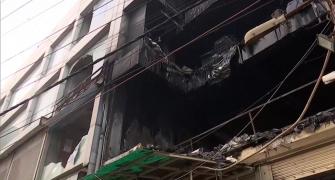 Delhi fire: Kin of victims look for loved ones