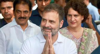 Rahul's disqualification as MP revoked, attends House