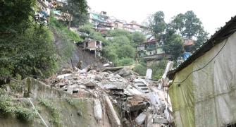 What led to collapse of over 100 buildings in Shimla