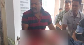 Odisha health minister shot by cop, battles for life
