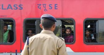 Gasps, silence as passenger trains cross crash site