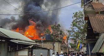 Imphal: Security forces, mob clash; houses set afire