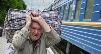 Ukrainians Flee To Escape Death