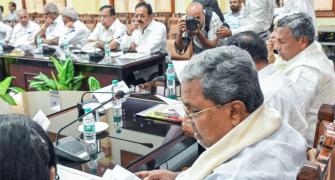 Siddaramaiah re-allocates portfolios to Kharge, Patil