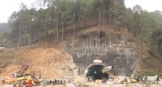 Safety cover being laid for rescue team inside tunnel