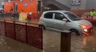 Delhi sees over 100mm rains; woman, baby fall in drain