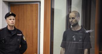 Russia frees US scribe among 4 in prisoner swap deal