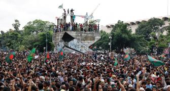 Protestors loot PM Hasina's home, smash Mujib statue