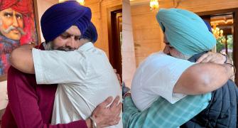 We can't repay...: Badal hugs cops who saved him