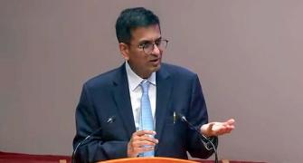 Former CJI Chandrachud denies reports of...