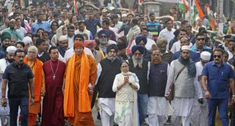 AAP holds processions, Mamata leads all-faith rally