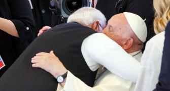 Modi hugs Pope Francis at G7; invites him to India
