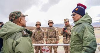 Rijiju interacts with Chinese soldiers near Tawang