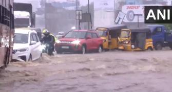 As rains lash Chennai, residents park cars on flyover