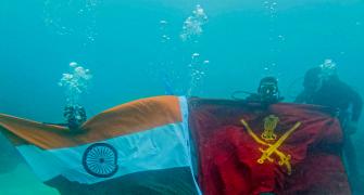 Hoisting The Tiranga Underwater