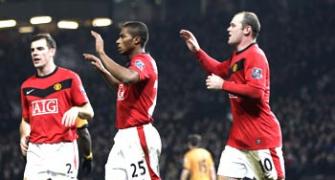 Man Utd cruise past Wolves to go level at top