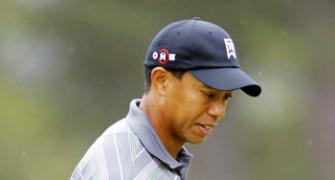Woods makes rousing return at US Masters