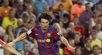 Messi fires Barca to dramatic Super Cup win