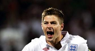 Gerrard rescues England to ease World Cup gloom