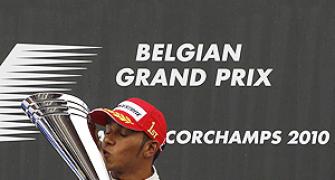 Hamilton wins Belgian GP to take title lead