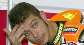 Rossi rides again, hopes for early return