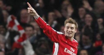 Champions League images: Bendtner performs a 'trick'