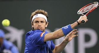 Indian Wells: Moya, Fish scrape through