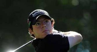 McIlroy and Quiros take control at Augusta