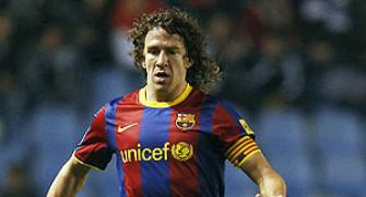 Barca captain Puyol back from injury for Real tie