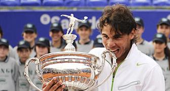 Nadal floors Ferrer to win sixth Barcelona title