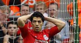 Liverpool's Suarez escapes with one match ban, fine
